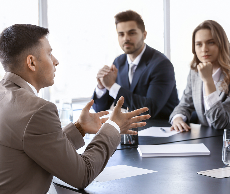 Employees in an office discussing